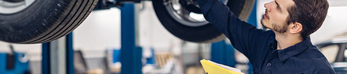 mechanic working on car